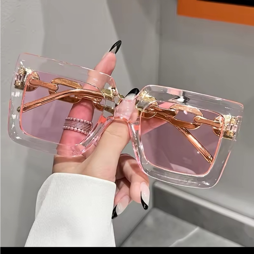 Stylish Pink and Gold Sunglasses
0331